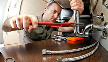 plumber repair wrench man working